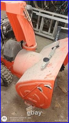 Ariens 11528LE Two Stage Gasoline Snow Blower 28in Orange Headlight