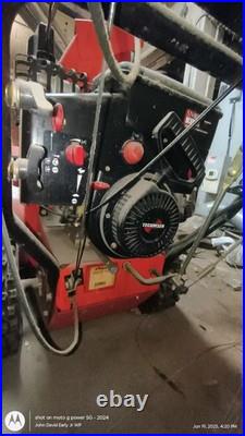 Ariens 11528LE Two Stage Gasoline Snow Blower 28in Orange Headlight