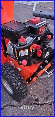 Ariens Deluxe ST24LE 254cc 24 Two Stage Snow Blower With Non-Abrasive Skid Shoes