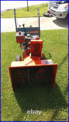 Ariens Deluxe ST24LE 254cc Two Stage Snow Blower Red Ariens Deluxe ST24LE 254cc Two Stage Snow Blower Red