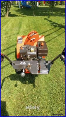 Ariens Deluxe ST24LE 254cc Two Stage Snow Blower Red Ariens Deluxe ST24LE 254cc Two Stage Snow Blower Red