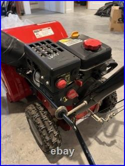 Yard Machines 24in 179cc Two-Stage Gas Snow Blower, Electric Start, Red/Black